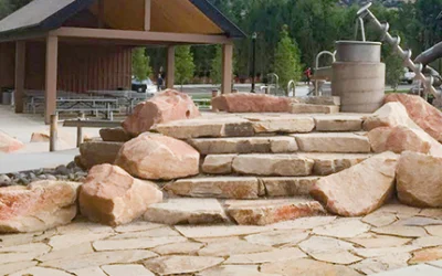 Knudsen Park, view of a house by the playground with a stony path and a flight of steps leading up to the house
