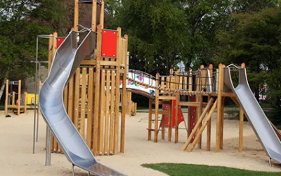 A play slide and a play structure on sand from the Dodenhof project